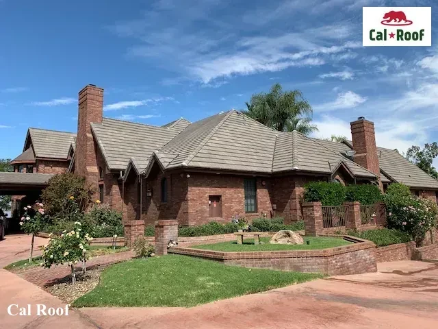 Large Brick House with Manicured Landscape