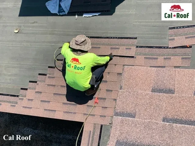 Roofer Installing Shingles on Roof